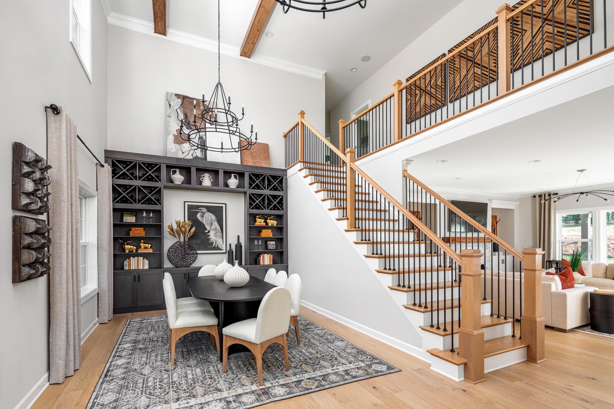 2-story dining room with built-in display cases