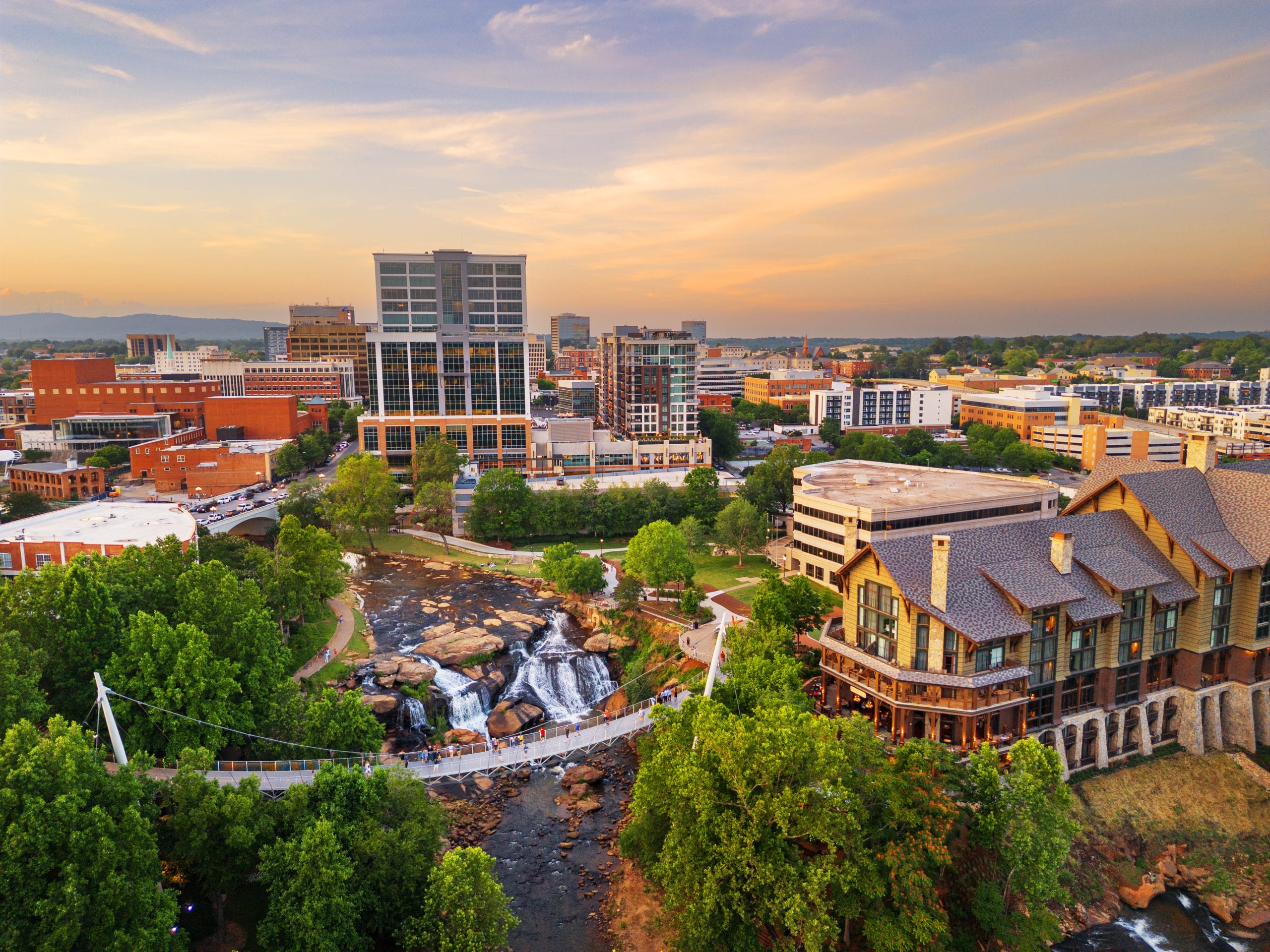 Greenville, South Carolina at Falls Park on Reedy Creek at dusk.